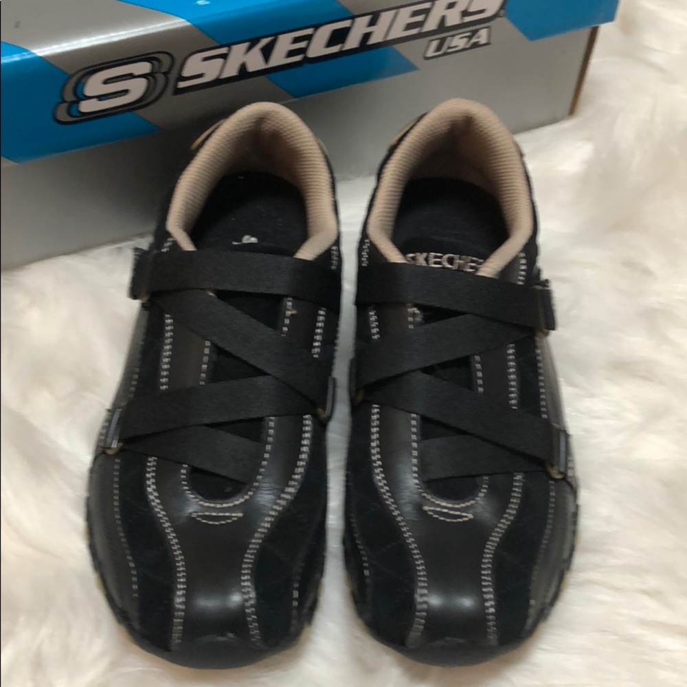 Black/tan sketchers bikers kingdom shoes